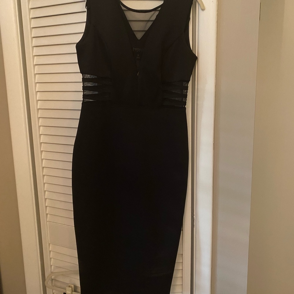 Classic black mid length dress w/mesh cut outs